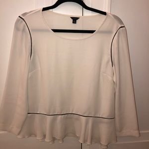 Peplum blouse with lattice trim